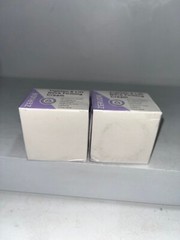 2 sealed tighten & lift neck firming cream 1.7oz each, damaged box