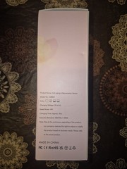 Anti-Aging Rejuvenation Device Pink And White With Charger Stand And Manual