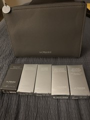 La Prairie Switzerland Grey Cosmetic Bag W 5 New Travel Size Skincare Products .