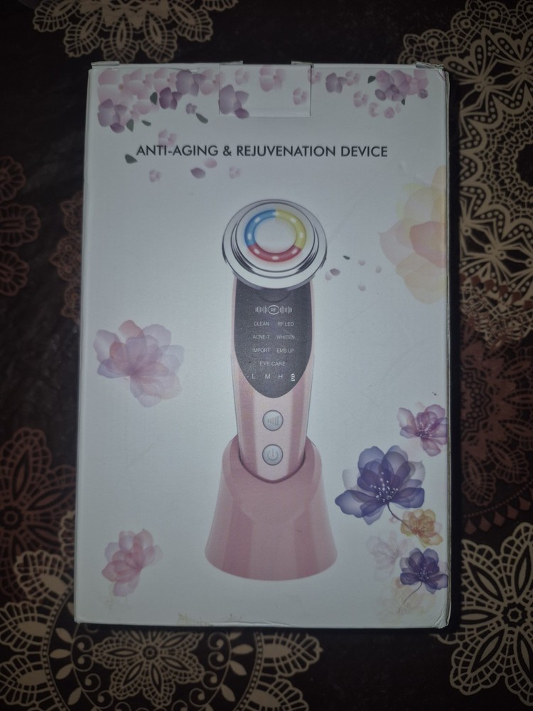 Anti-Aging Rejuvenation Device Pink And White With Charger Stand And Manual