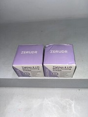 2 sealed tighten & lift neck firming cream 1.7oz each, damaged box